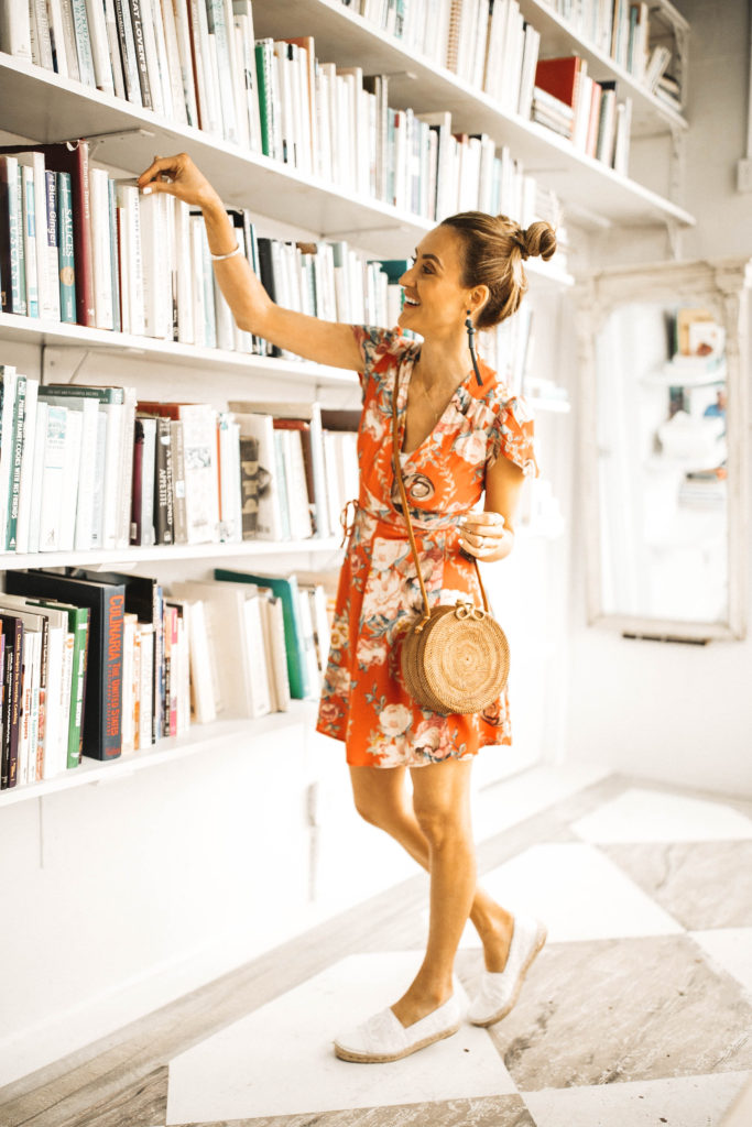 mini floral dress and round straw bag - Spring Essentials: Lulus Dresses, Shorts, Top and Jumpsuit featured by popular Indianapolis fashion blogger, Karina Style Diaries