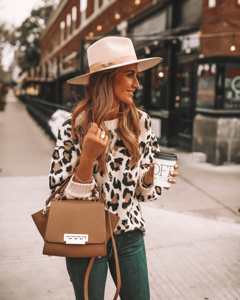 Karina Reske wearing leo print sweater Zac Posen Eartha handbag 