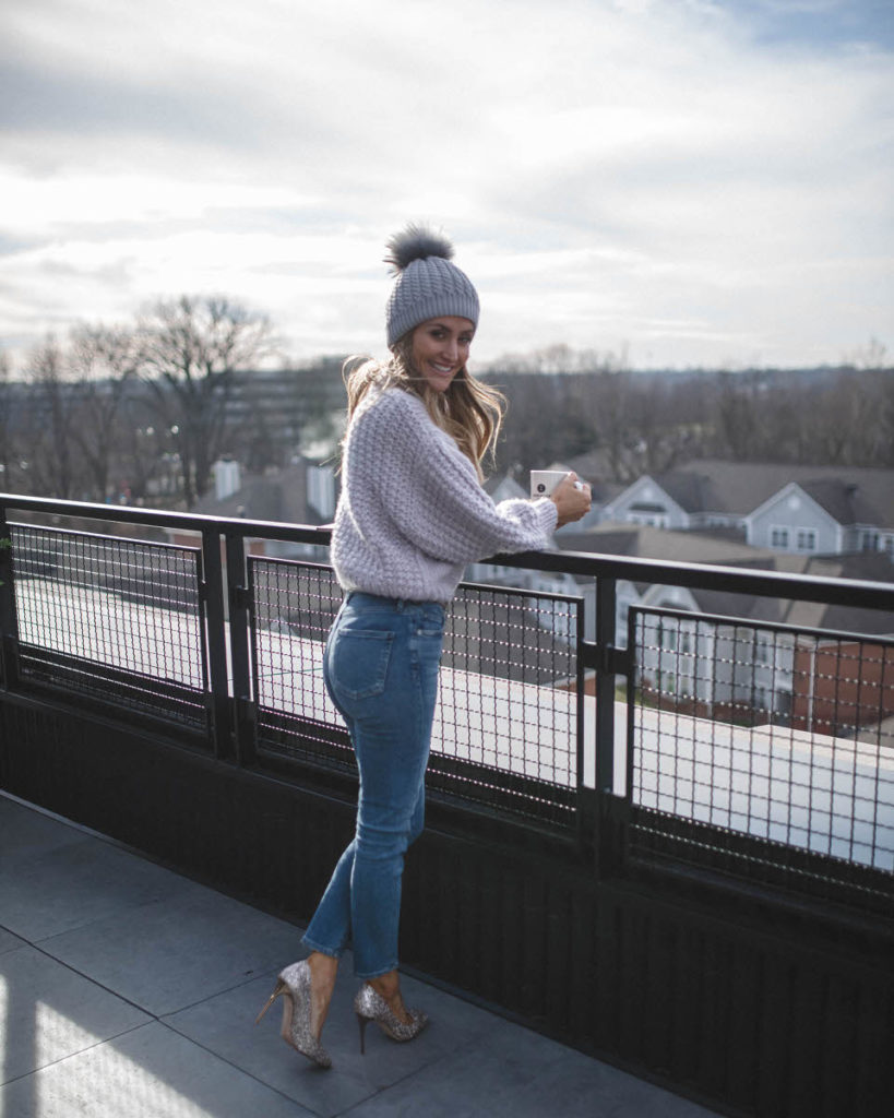 Chicwish cute winter looks featured by top Indianapolis fashion blog, Karina Style Diaries: image of a woman wearing a Chicwish lavender cropped sweater, Evereve cropped jeans, Jimmy Choo glitter pumps, a pom pom beanie hat and a Gucci belt