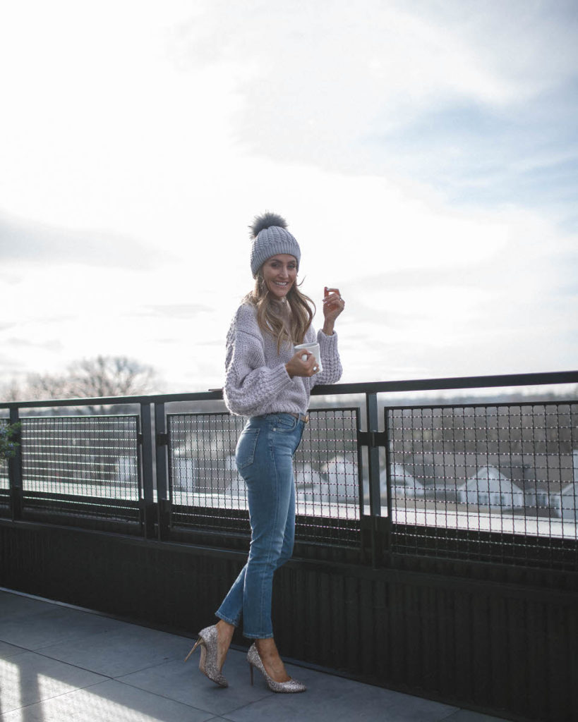 Chicwish cute winter looks featured by top Indianapolis fashion blog, Karina Style Diaries: image of a woman wearing a Chicwish lavender cropped sweater, Evereve cropped jeans, Jimmy Choo glitter pumps, a pom pom beanie hat and a Gucci belt