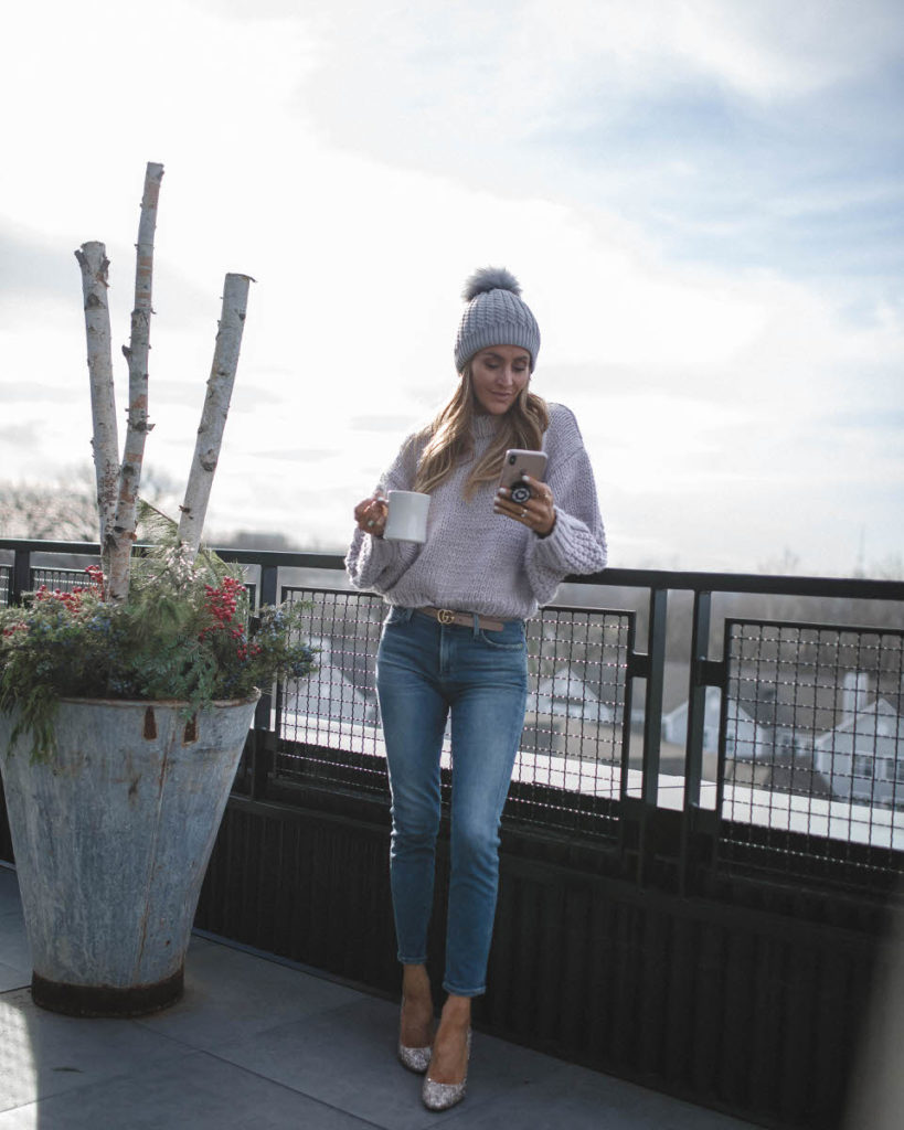 Chicwish cute winter looks featured by top Indianapolis fashion blog, Karina Style Diaries: image of a woman wearing a Chicwish lavender cropped sweater, Evereve cropped jeans, Jimmy Choo glitter pumps, a pom pom beanie hat and a Gucci belt