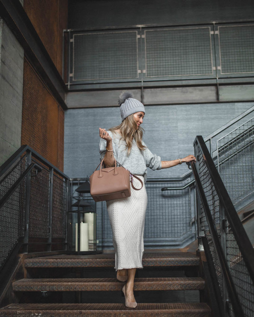 Chicwish cute winter looks featured by top Indianapolis fashion blog, Karina Style Diaries: image of a woman wearing a Chicwish knit skirt, H&M grey sweater, Givenchy Antigona bag and a grey pom pom beanie hat