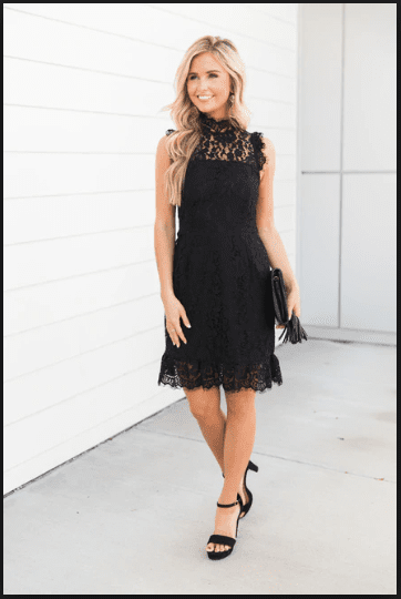 3 Cute Holiday Party dresses under $50 featured by top Indianapolis fashion blog, Karina Style Diaries: image of a woman wearing a Pink Lilly black lace dress, & Other Stories A Line Wool blended coat, Sam Edelman leopard heels and a Zac Zac Posen cross body bag