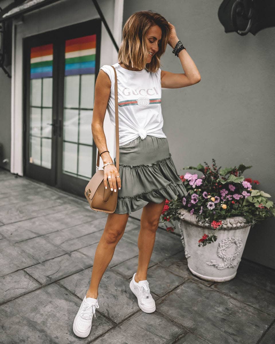 Karina Reske | gucci tee | flowy ruffle mini skirt olive green | white air force nike 