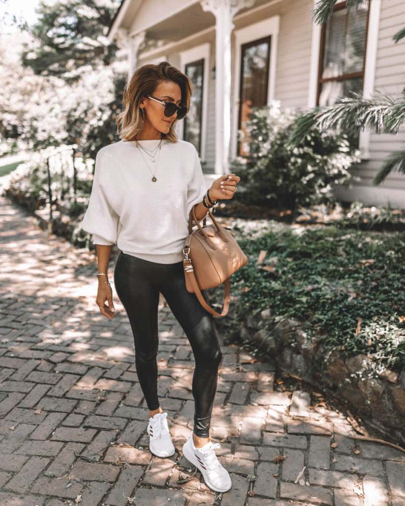 Karina Style Diaries wears spanx faux leather leggings white sweater white adidas tennis shoes givenchy antigona medium pink casual style sweater style 