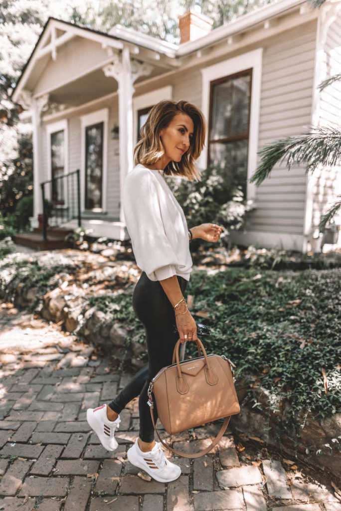 Karina Style Diaries wears spanx faux leather leggings white sweater white adidas tennis shoes givenchy antigona medium pink casual style sweater style 