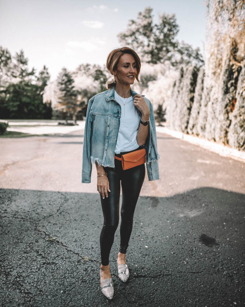 Karina Style Diaries wearing spanx faux leather leggings white tee jeans jacket belt bag snakeskin loafers