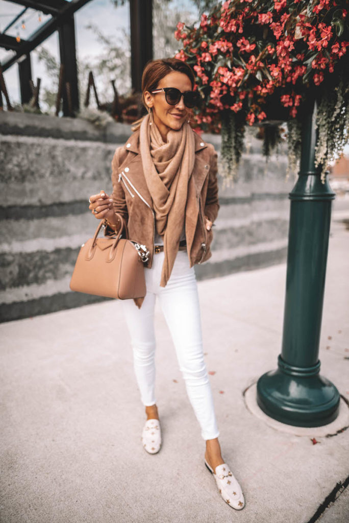 Karina Style Diaries wearing white jeans chic outfit suede moto jacket cashmere scarf gucci princetown bumblebee loafer givenchy antigona gucci belt