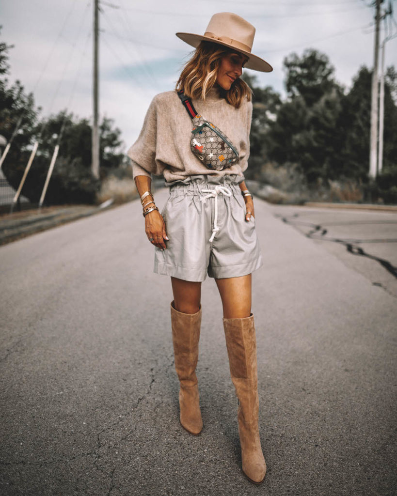 Karina Style Diaires wearing fine-knit beige oatmeal sweater high waist paper bag foil shorts over the knee suede boots gucci belt bag lack of colors ivory rancher hat