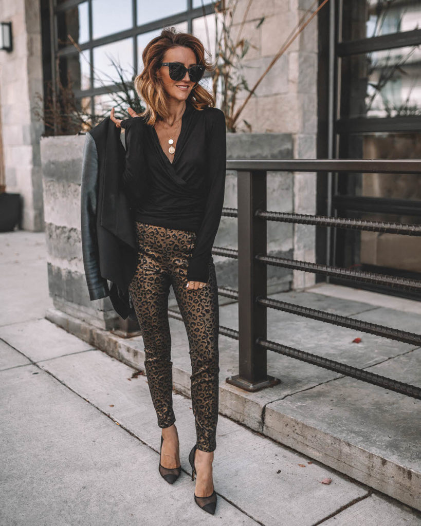 Karina Style Diaries wearing black long sleeve top gold leopard print pants work holiday outfit