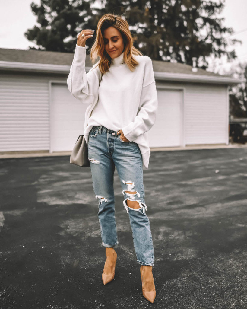 Karina Reske wearing Oversized free pwople white sweater levi's 501 distressed jeans nude pumps