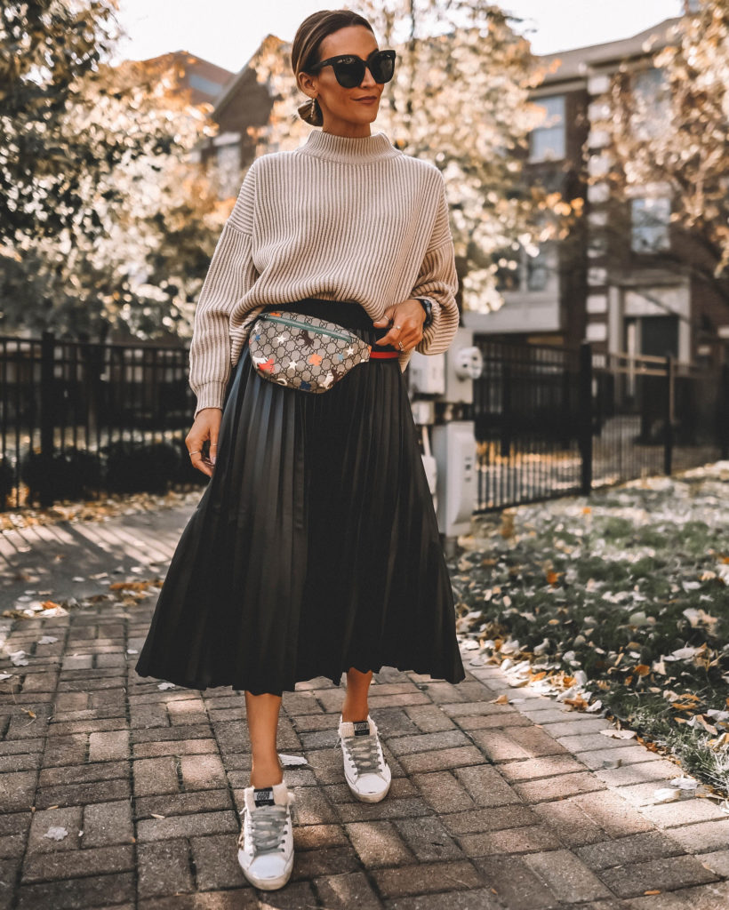 Karina Style Diaries pleated skirt oversized sweater Gucci belt bag Golden Goose sneakers 