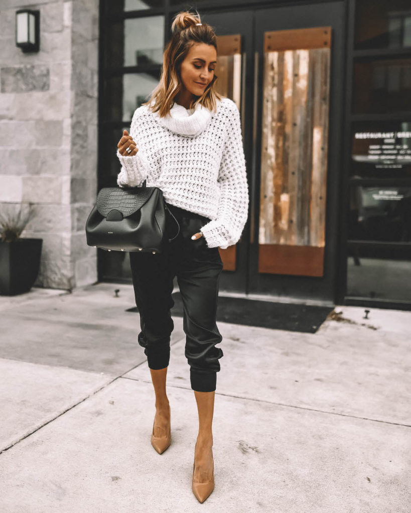 Karina Style Diaries wearing white cowl neck sweater black satin joggers nude pumps