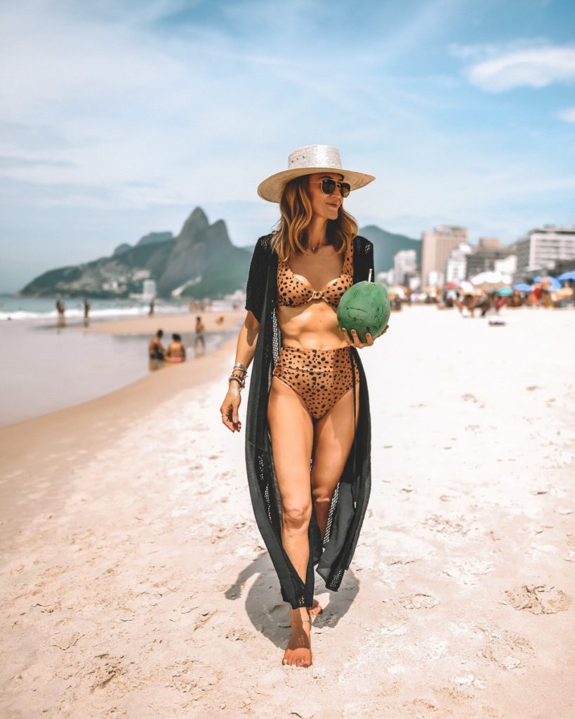 Karina Reske Ipanema beach wearing animal print bathing suit black crochet coverup