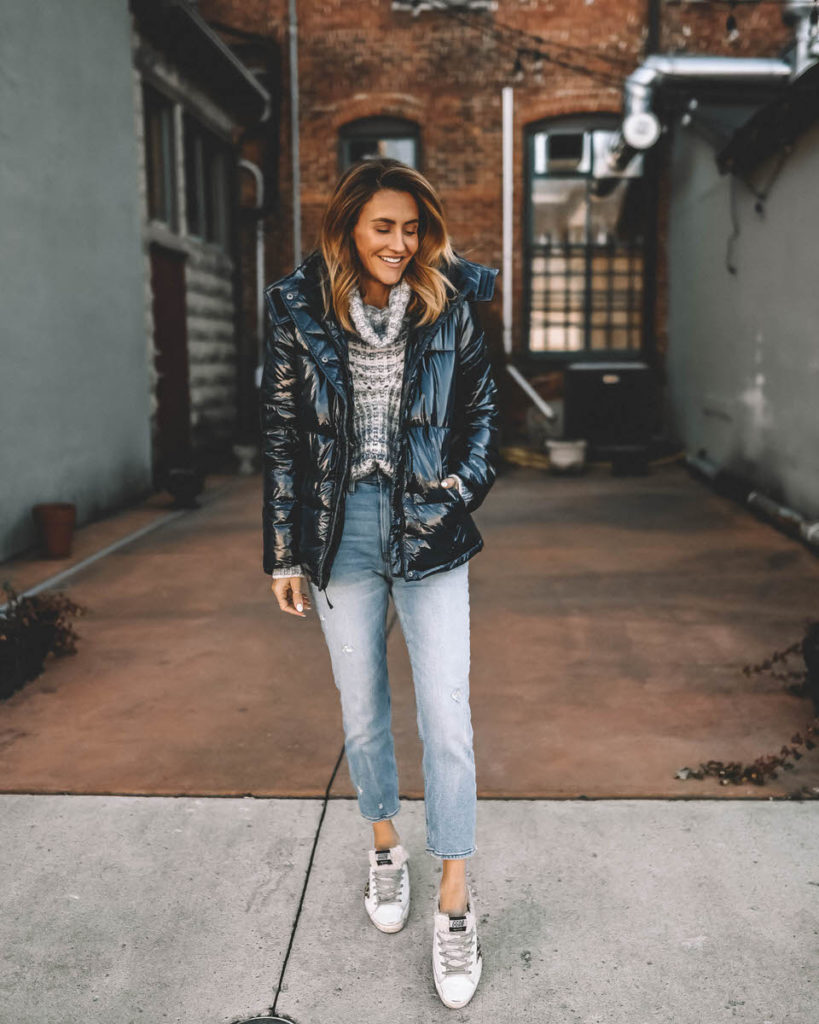 Karina Reske wearing wet look jacket turtleneck sweater mom jeans golden goose sneaks