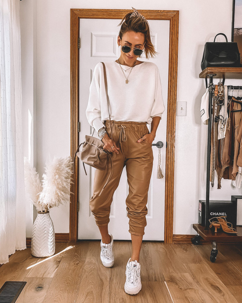 Karina Style Diaries styling faux leather joggers white sweater white sneakers croos body Protea bag Mansur Gavriel Sporty Style