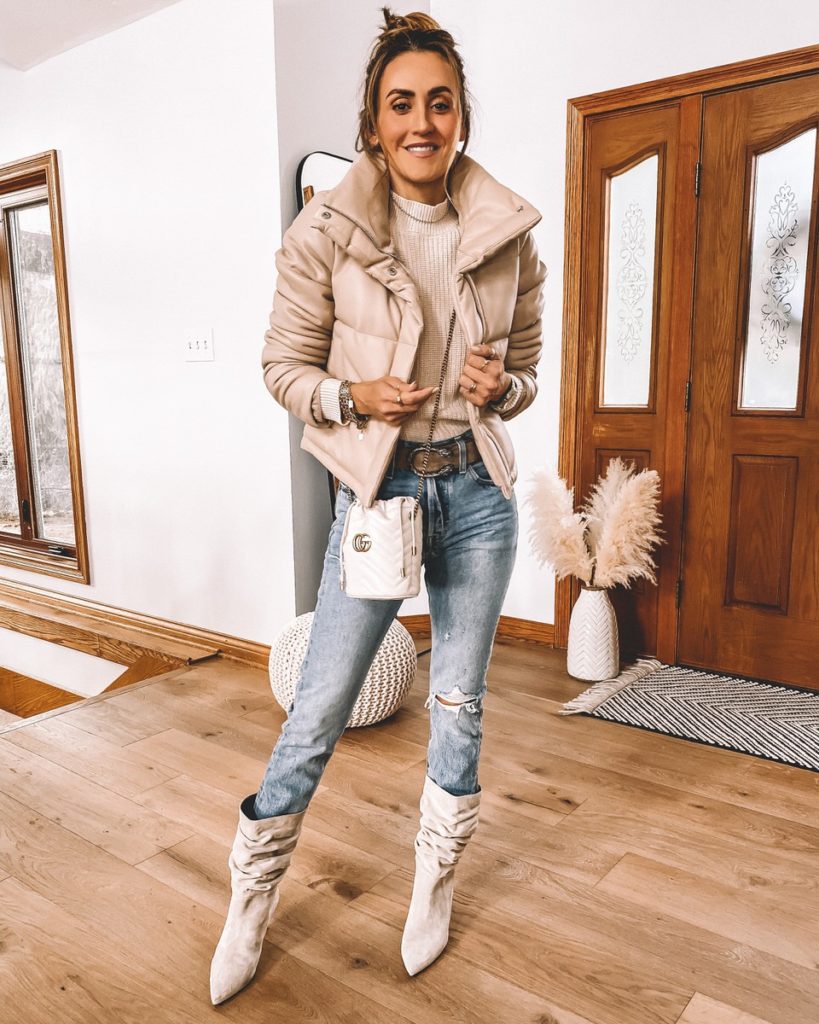 Karina Style Diaries wearing puffer jacket levis skinny jeans shaker puff sleeve slouchy boots gucci bucket bag and belt fall style
