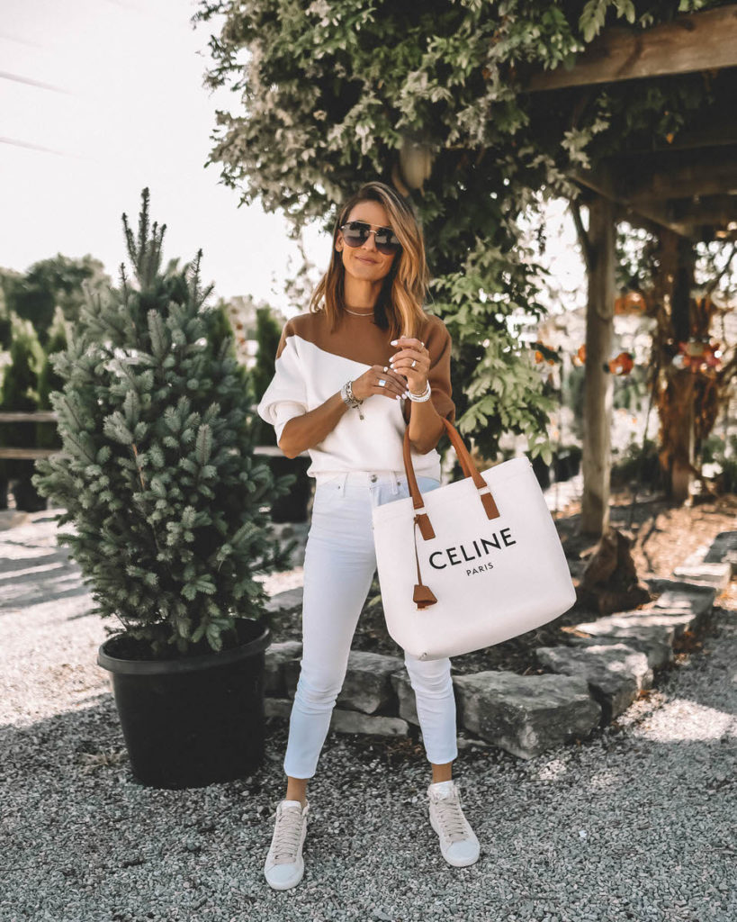 Karina Style Diaries wearing color block sweater white and camel white jeans celine canvas shopper tote fall style