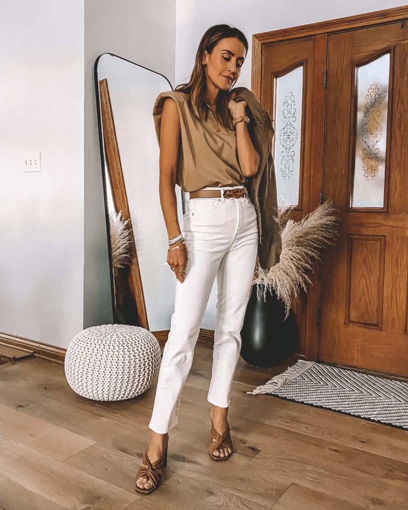 Karina Style Diaries wearing lululemon jacket padded shoulder shirt high rise white pants gucci belt neutral style