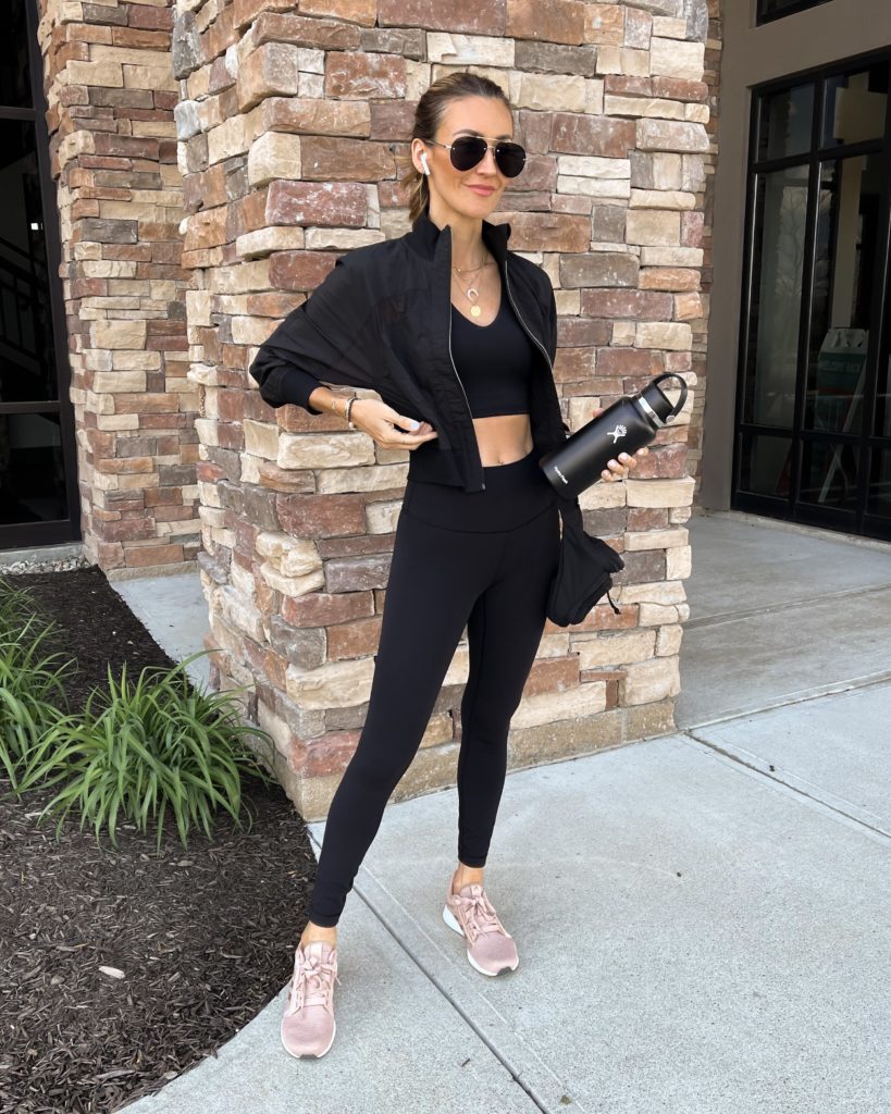 Karina Style Diaries wearing amazon sports tanks lululemon jacket and wunder leggings adidas running shoes balenciaga belt bag neutral style