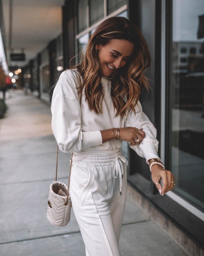 Karina Wears walmart white jogger set with sneakers and gucci bag