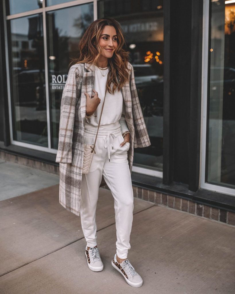 Karina wears walmart jogger set with plaid coat and gucci bag