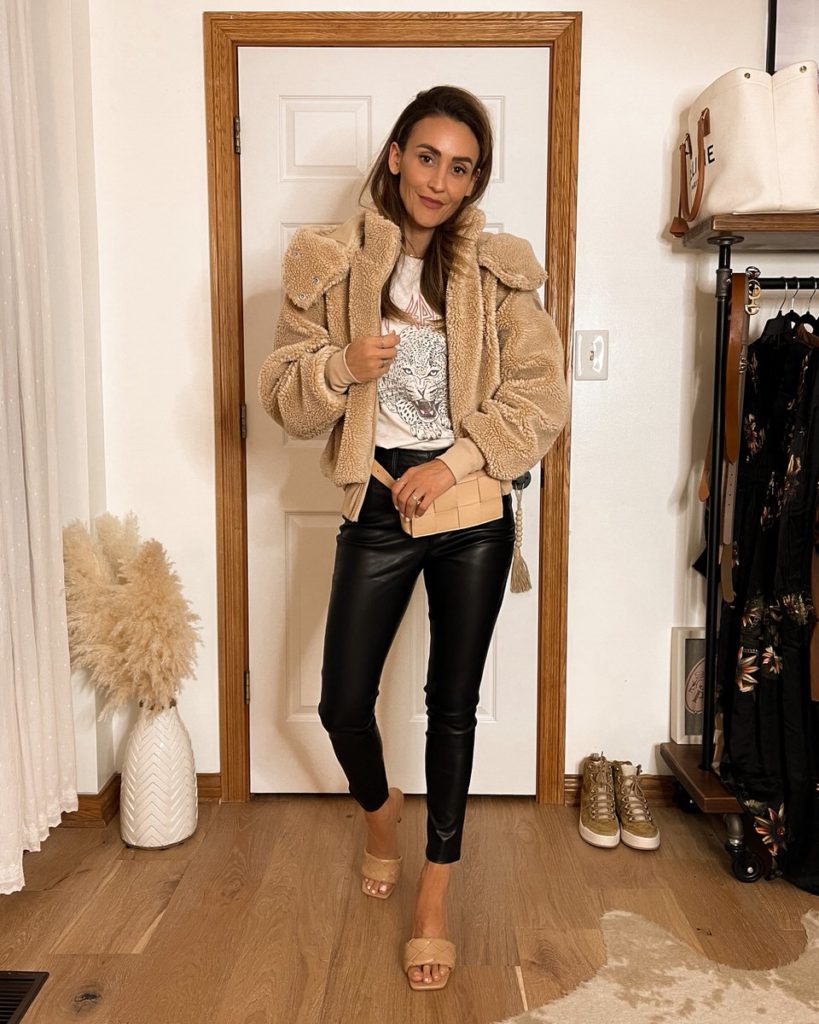 Karina wears alo yoga sherpa jacket and walmart faux fur leggings