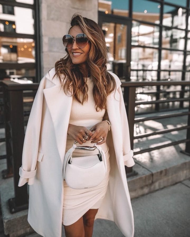 Karina wears express white dress and white coat