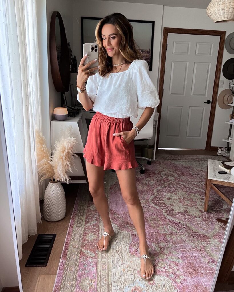 karina wears amazon linen white puff sleeve top with linen ruffle shorts