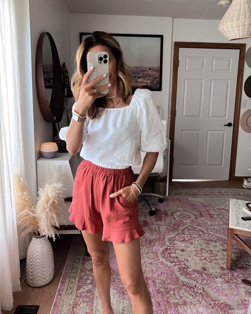 karina wears amazon linen white puff sleeve top with linen ruffle shorts