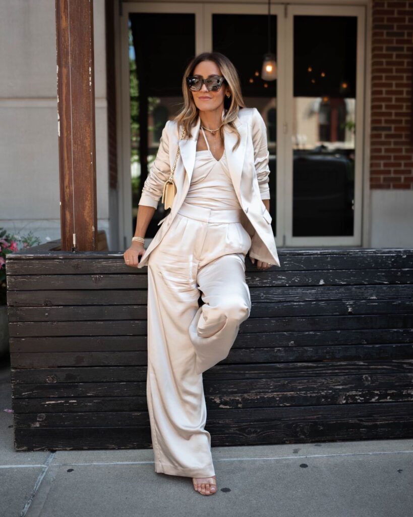 Karina wears Express Satin suit separates