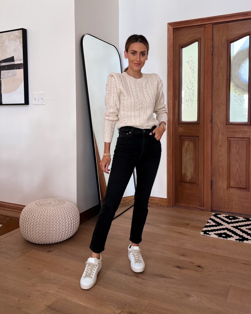 Karina wears black agolde jeans with evereve top