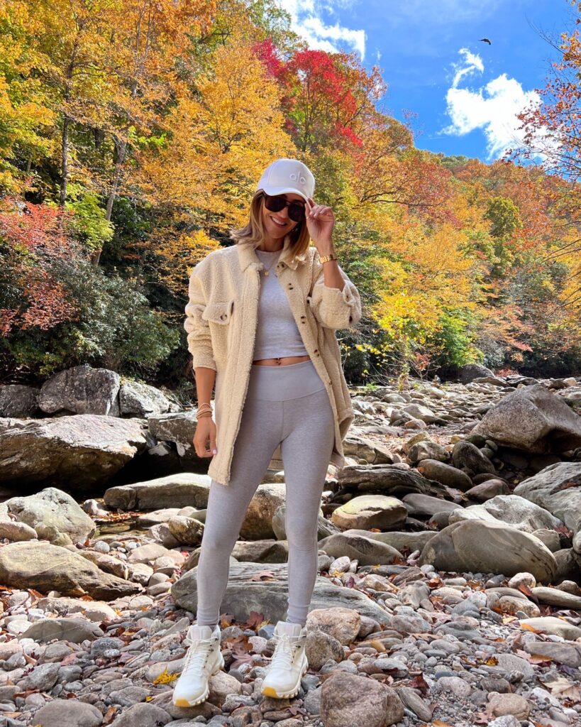 Karina wears Alo Yoga leggins with sherpa jacket and on cloud hiking boots