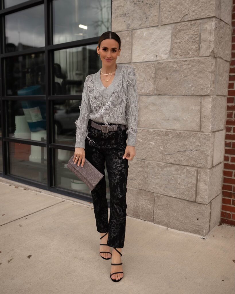 Karina wears WHBM feather and sequin sweater with floral pant