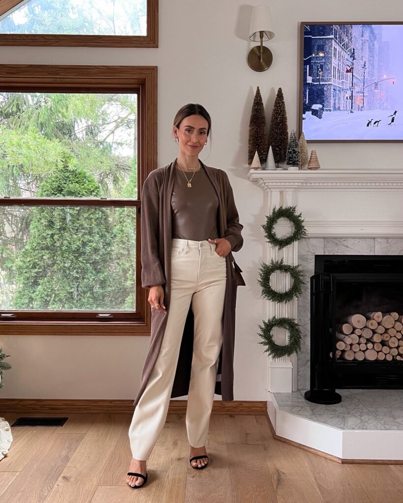 Karina wears Express faux leather pants with body suit and cardigan