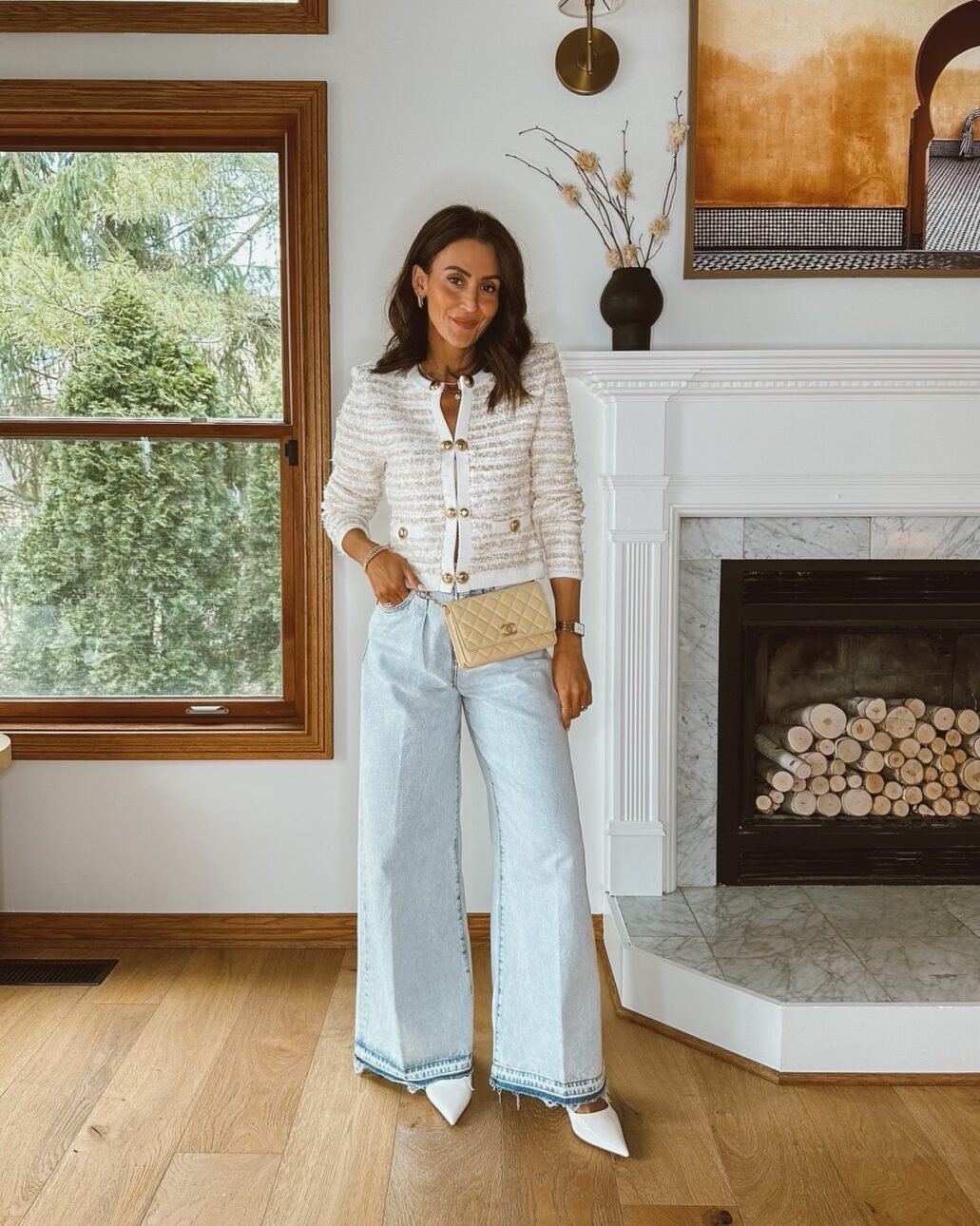 Karina wears Express wide leg jeans with sweater jacket