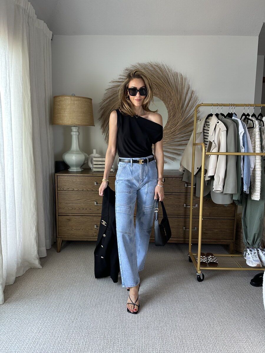 Black one shoulder top and slim cargo jeans