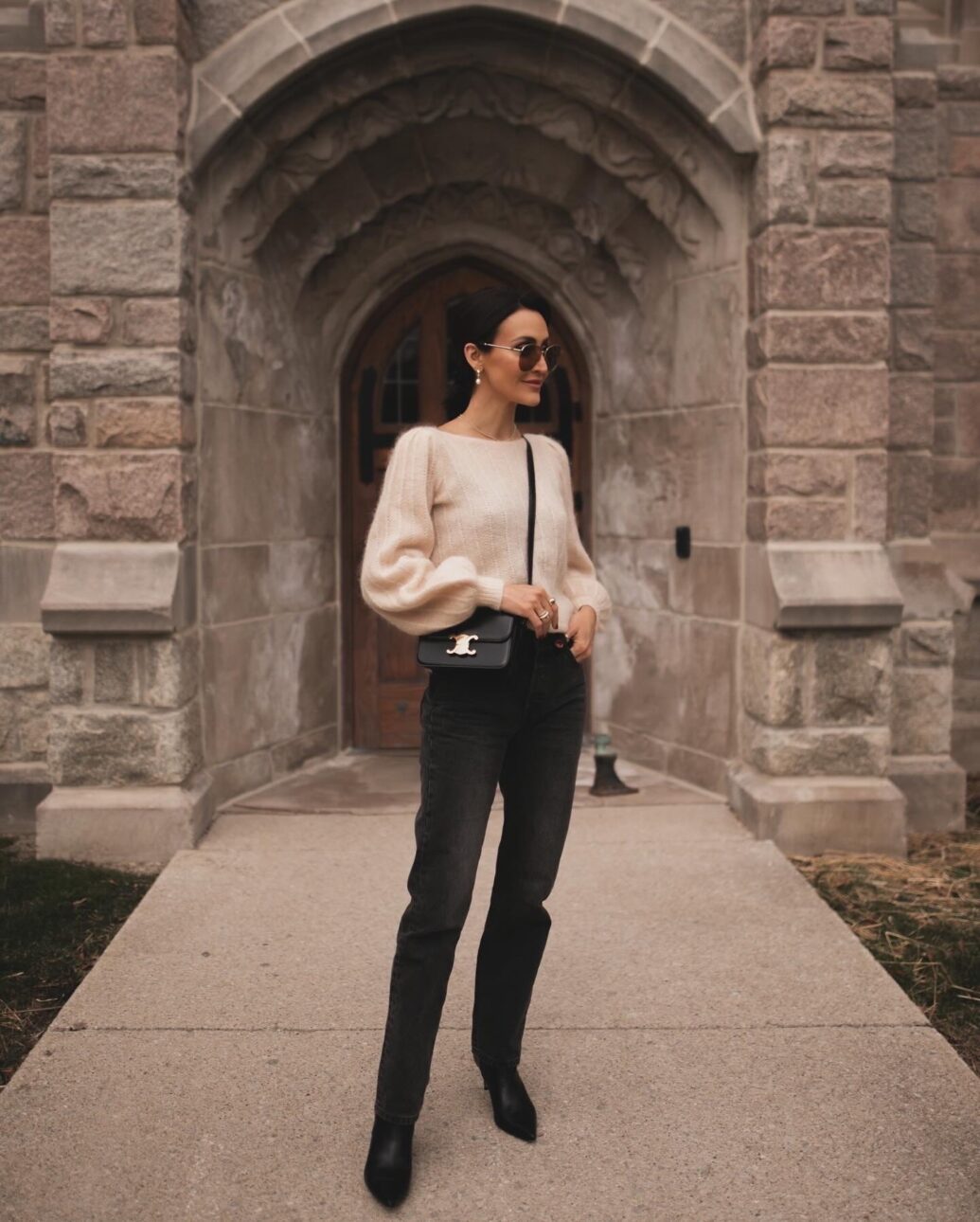 black jean outfit with tall boots