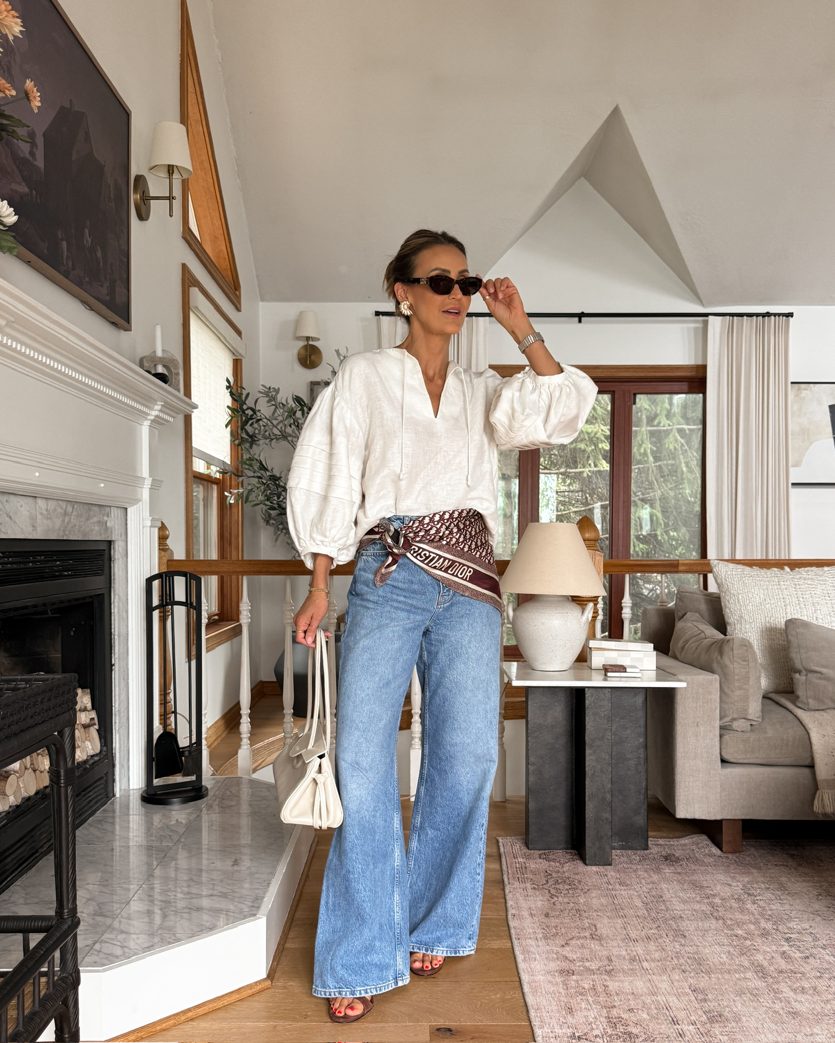 Dior silk scarf, linen peasant blouse, wide leg high rise jeans, brown suede heels, Miu Miu sunnies, Staud shoulder bag, scarf summer outfit