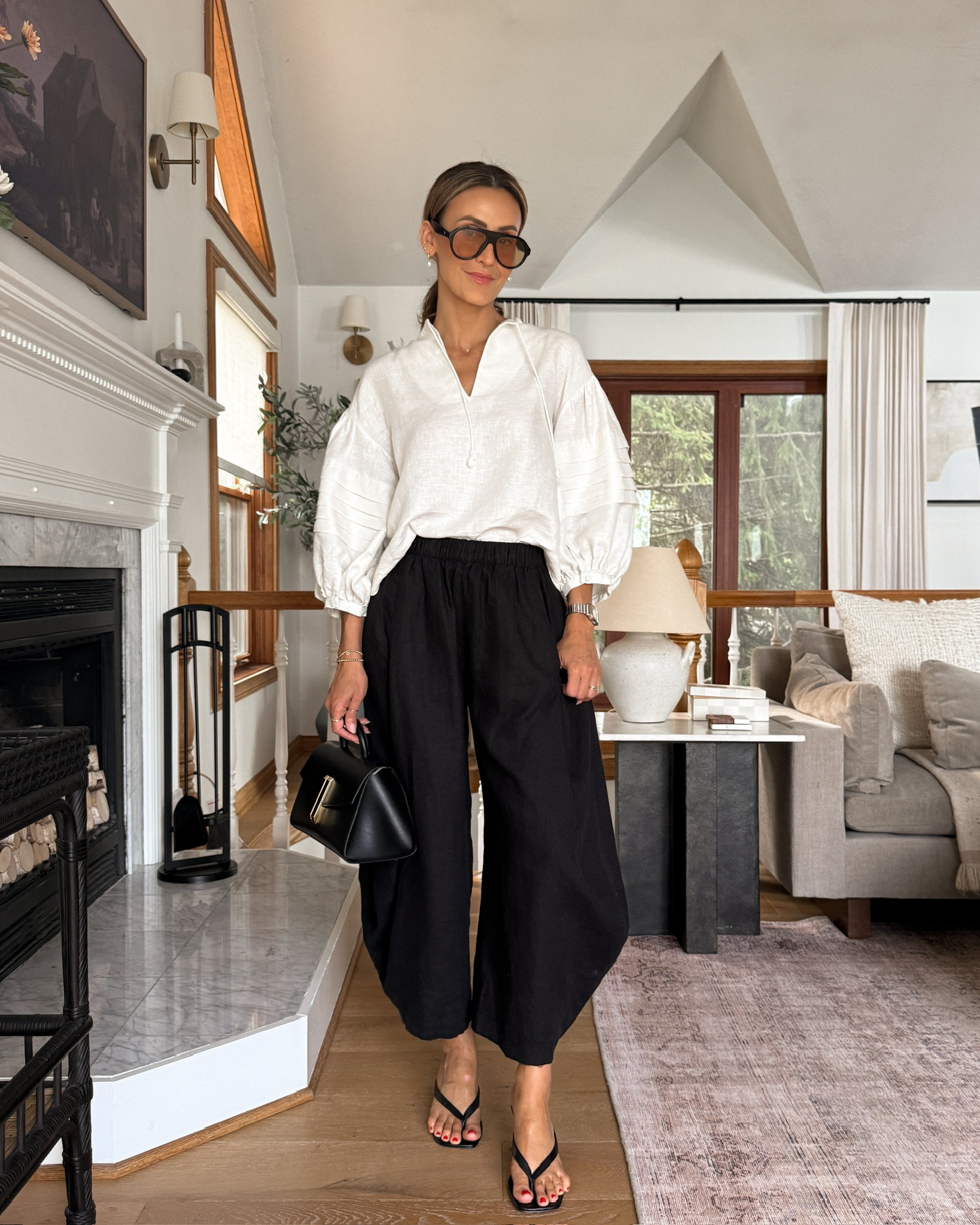 white peasant blouse, black balloon pant, VANLINKER Retro Aviator sunnies, black thong kitten heels, DeMellier black leather bag with gold accents, bold and edgy summer outfit